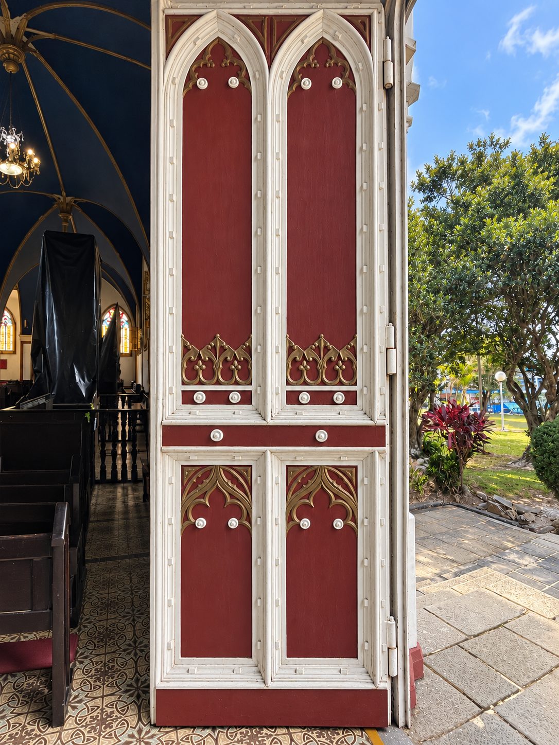 A tall painted church door in Grecia, Costa Rica