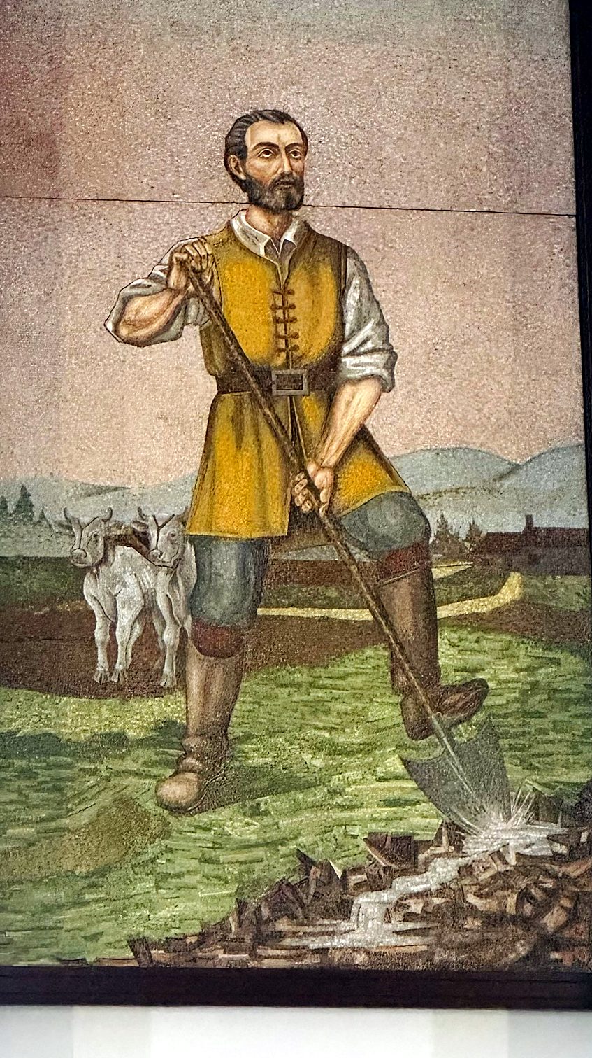 A mosaic of San Isidro Labrador at the church in the center of San Isidro