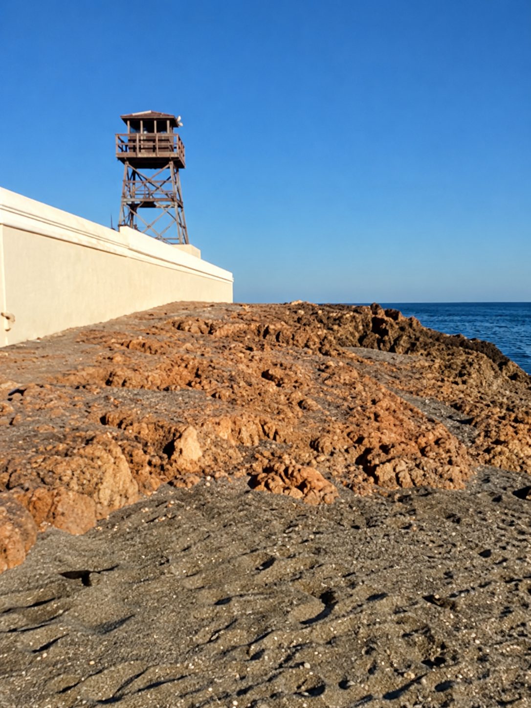 A lookout tower on the rocks by the sea in Stuart, Florida