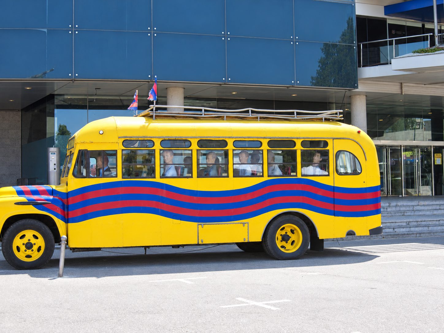 An old yellow FC Barcelona bus