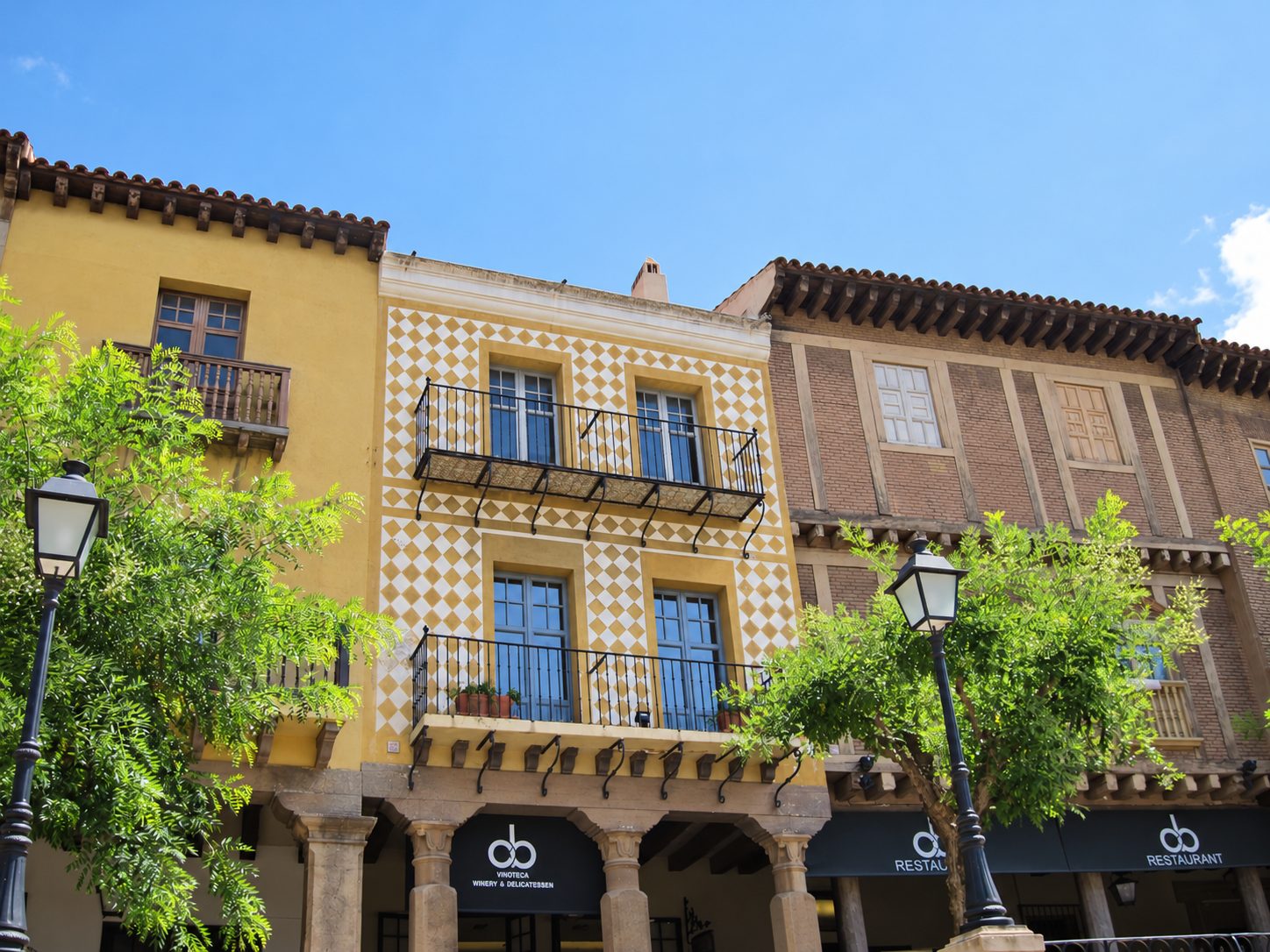 Colorful old buildings around a plaza in Barcelona