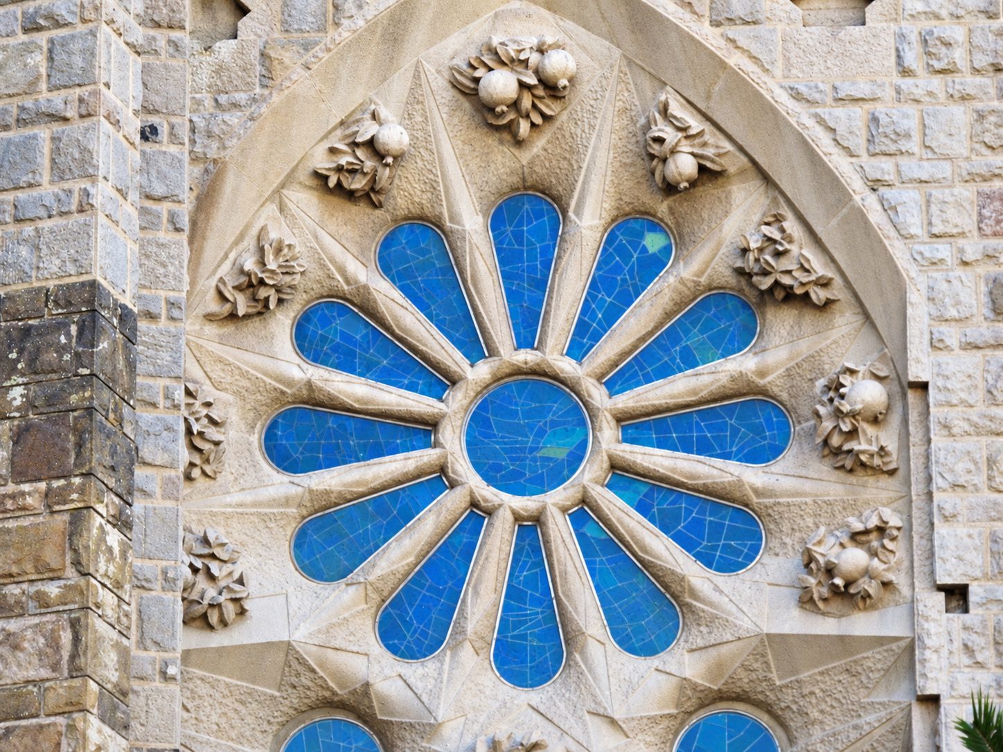 A round window with blue glass on the Sagrada Família
