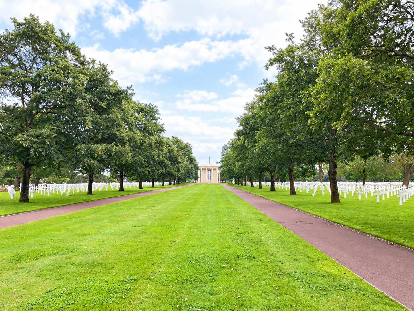 A tree-lined path at the Normandy American Cemetery