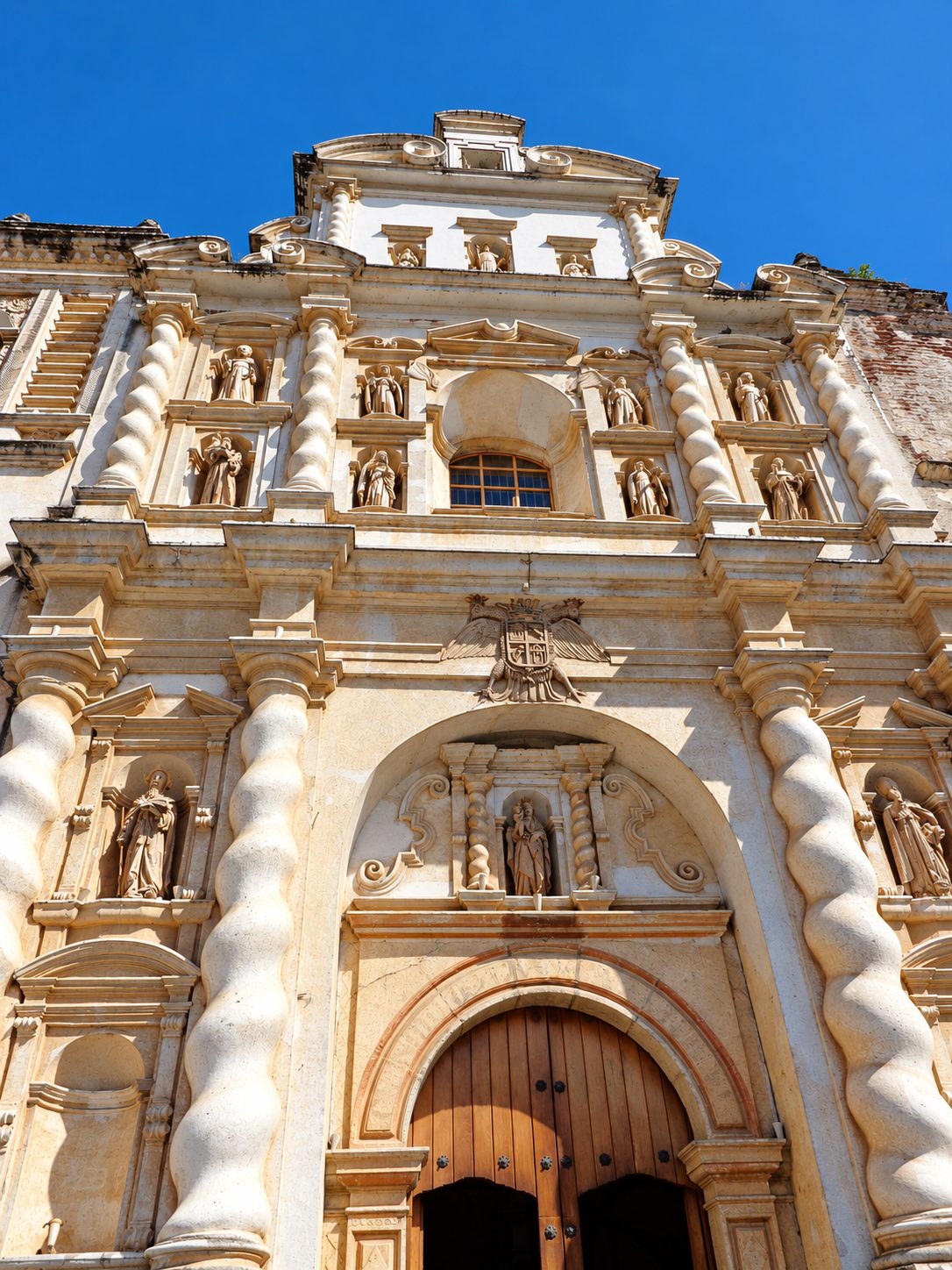 The white carved front of the Cathedral of Antigua Guatemala