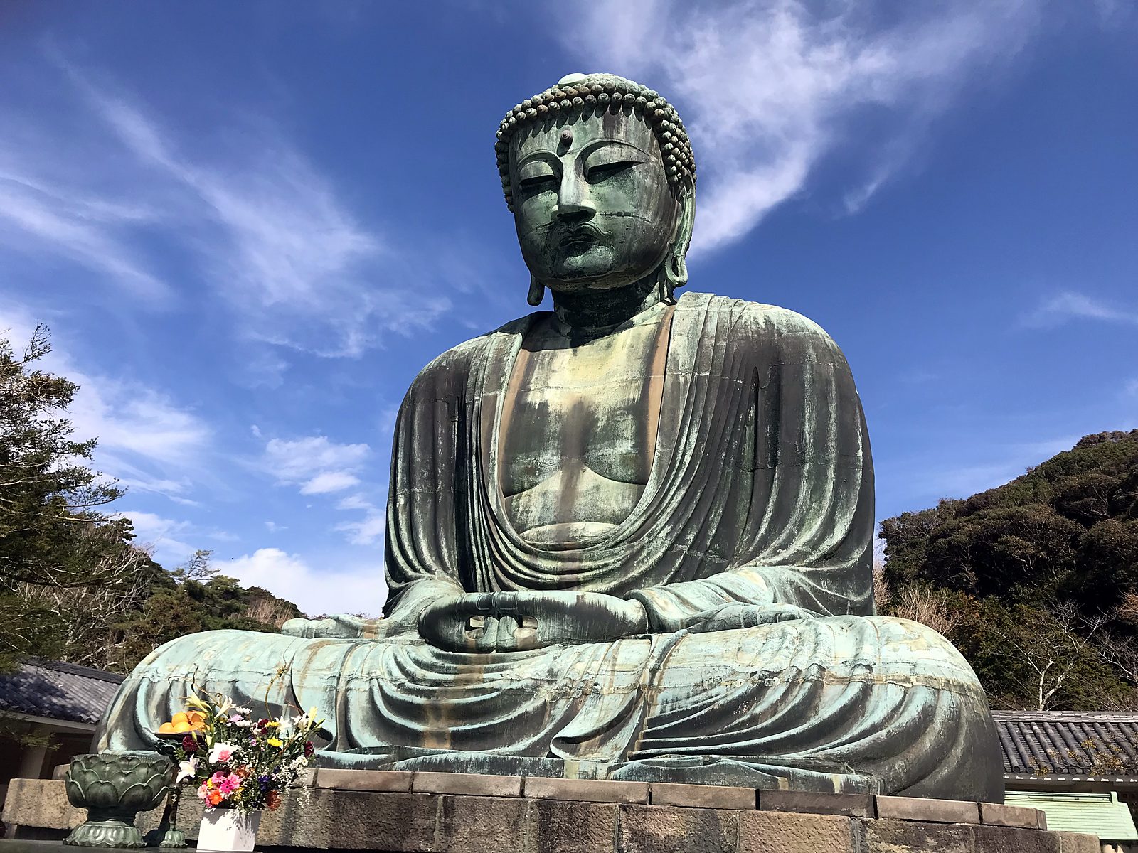 The Great Buddha of Kamakura under a blue sky