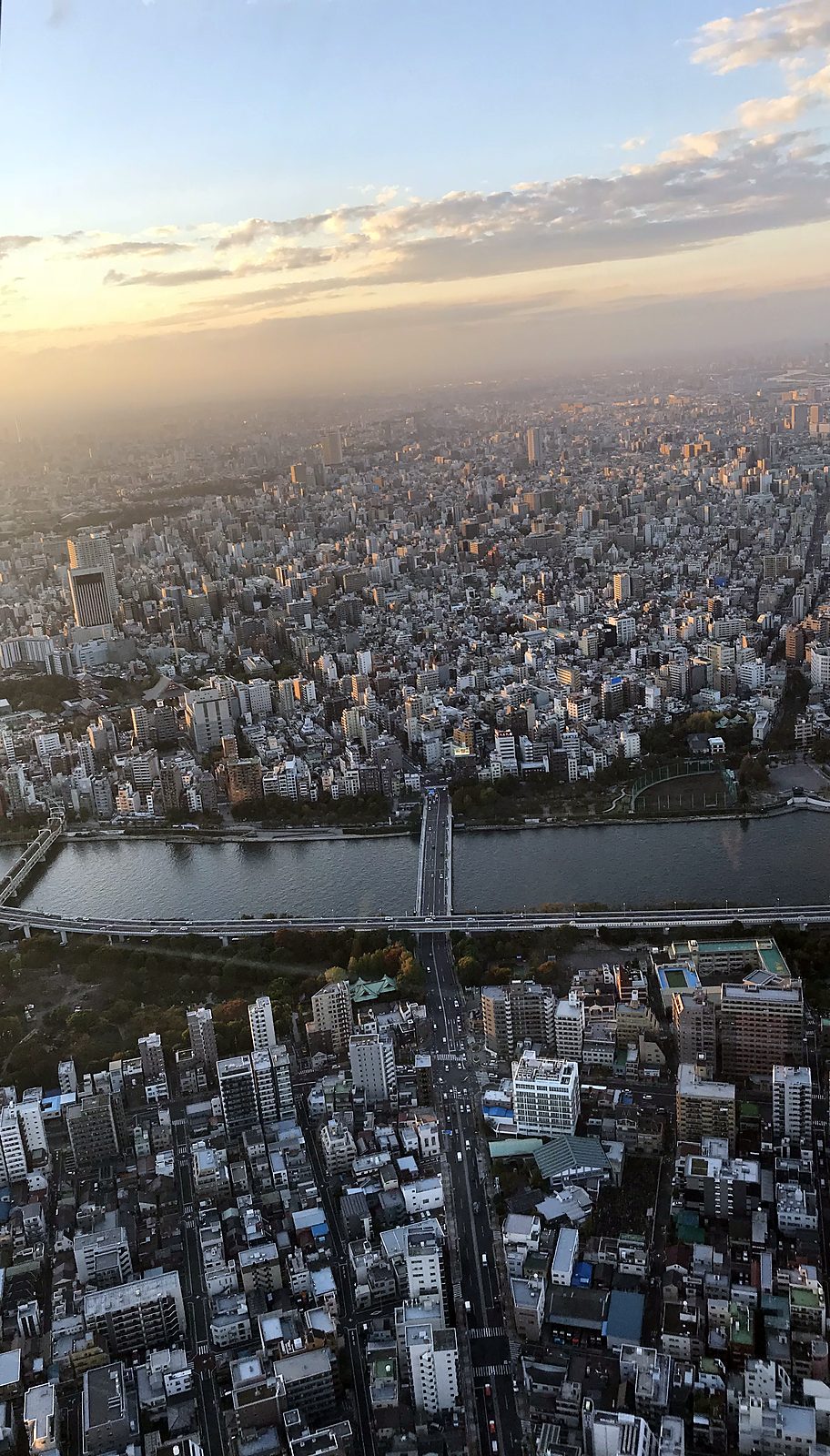 Tokyo and a river seen from high above at sunset