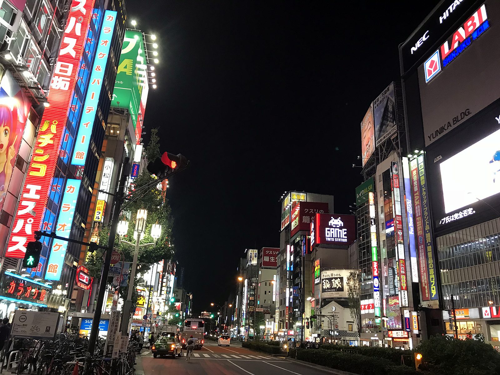 Bright signs on a Tokyo street at night