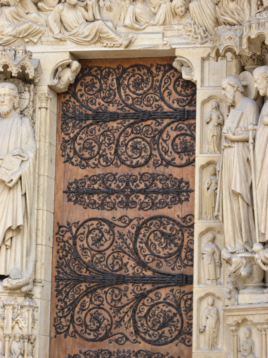 Ironwork on a carved door at Notre Dame
