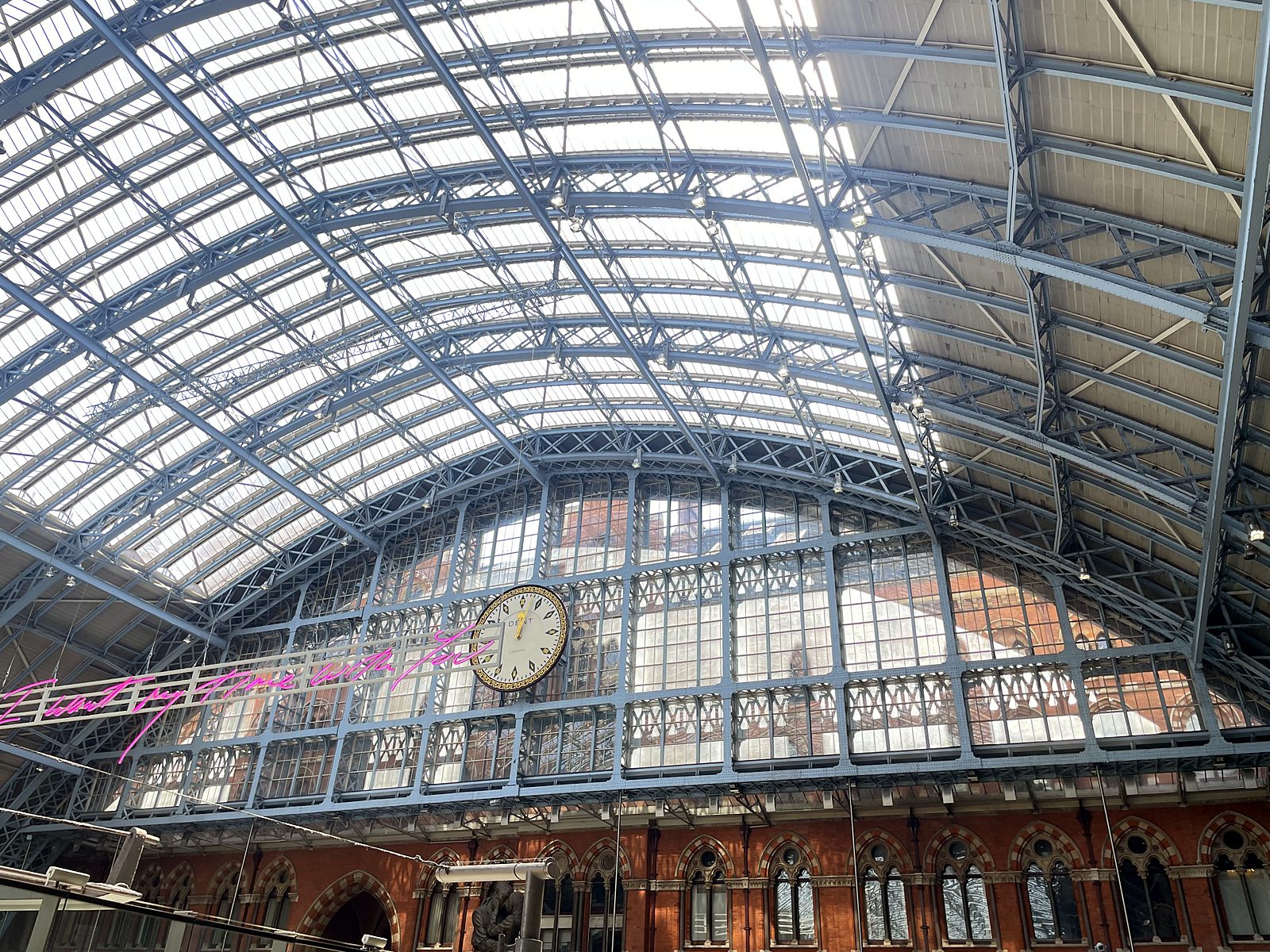 The glass roof and clock at St. Pancras station