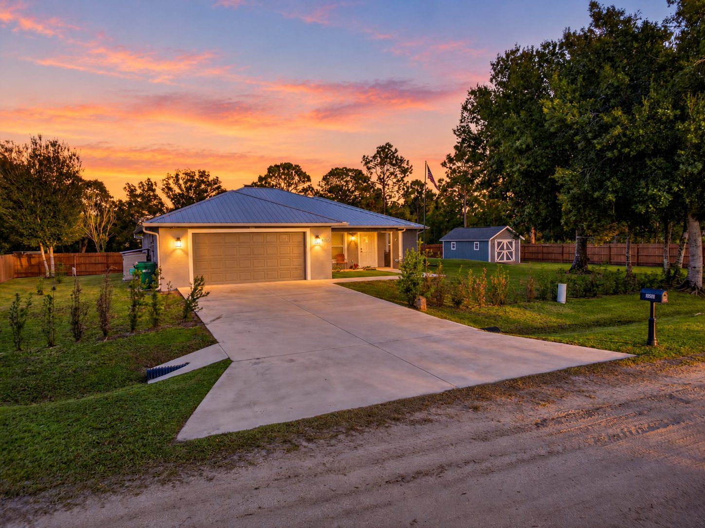 Front of the home at 10526 N Center Ave, Okeechobee, at sunset