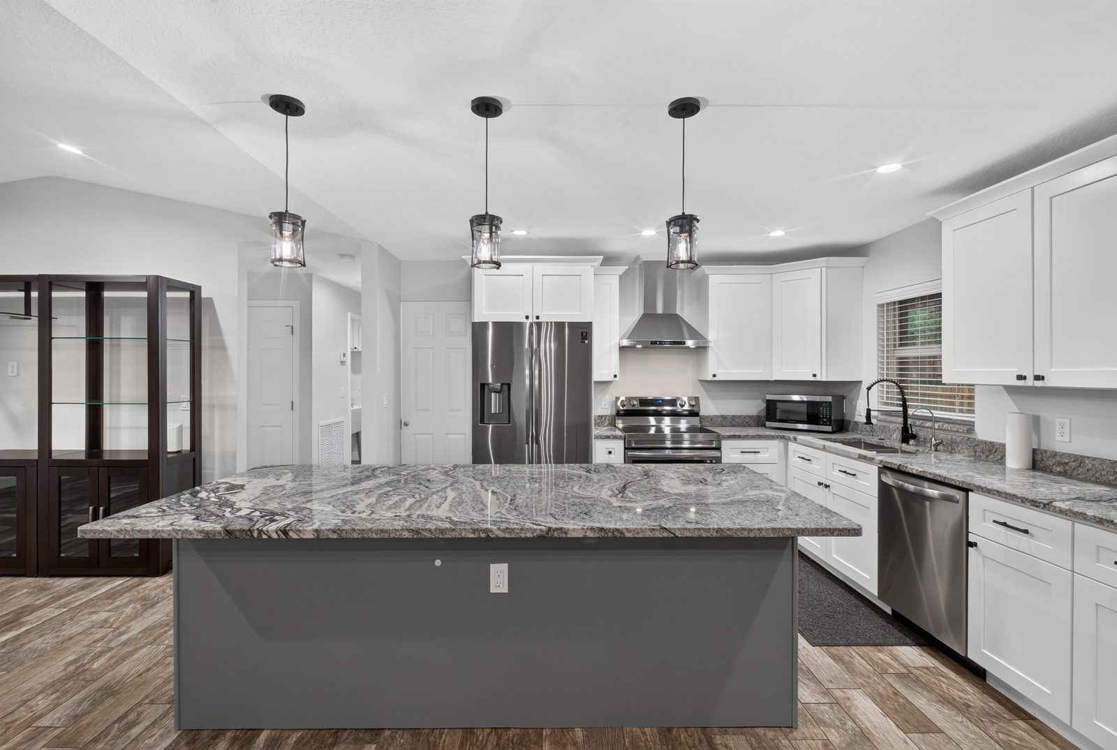Kitchen with a large island and stainless steel appliances