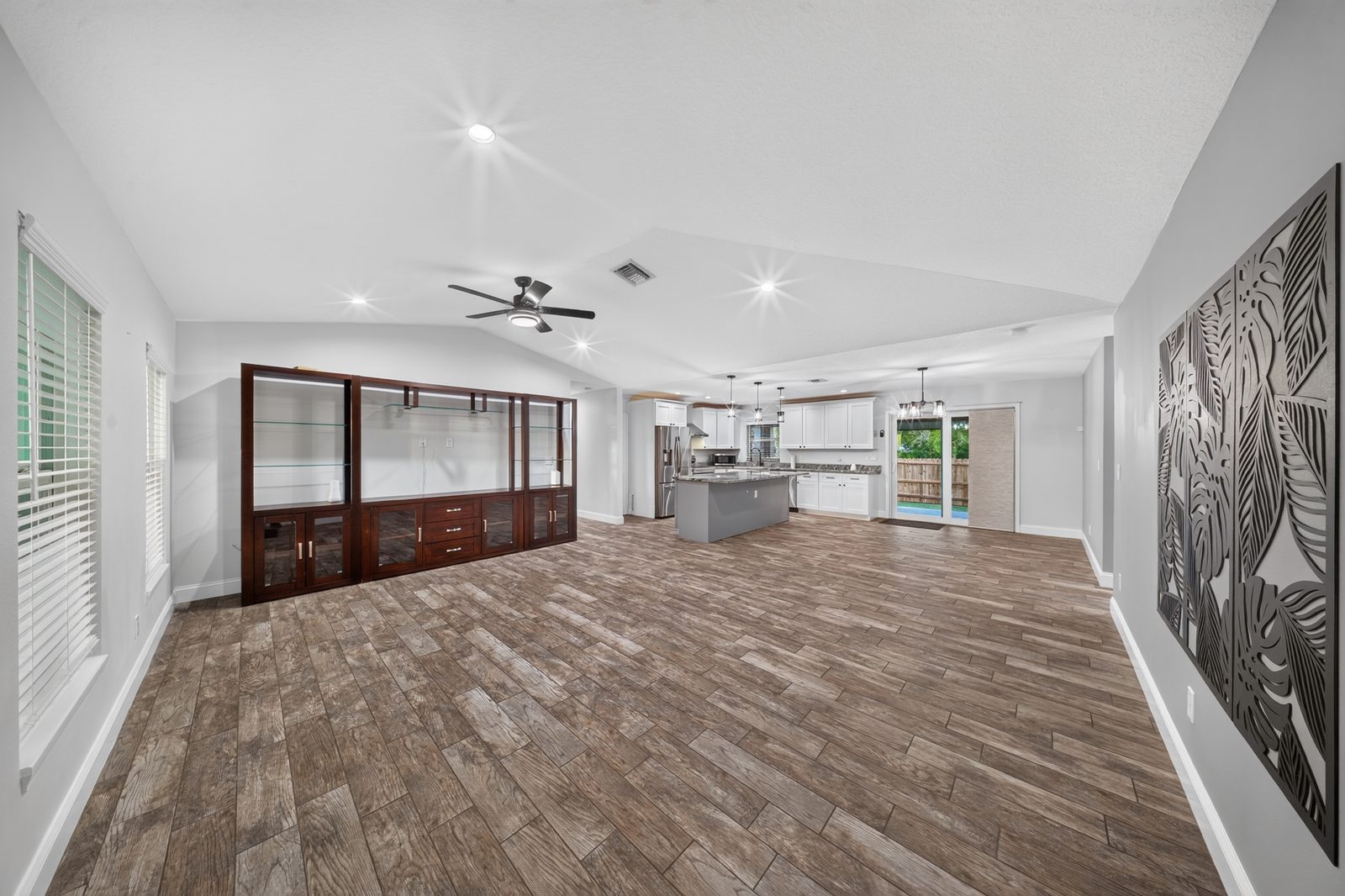 Open living area with wood-look floors