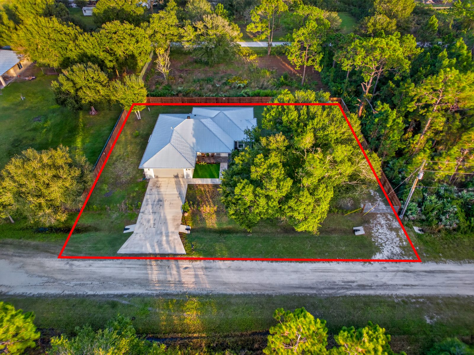 Aerial view of the home on its double lot