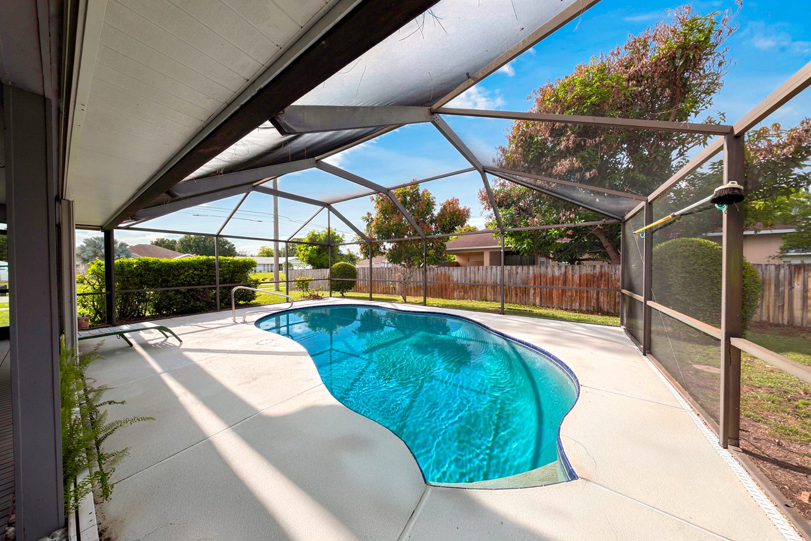Oversized screened pool with a covered lanai