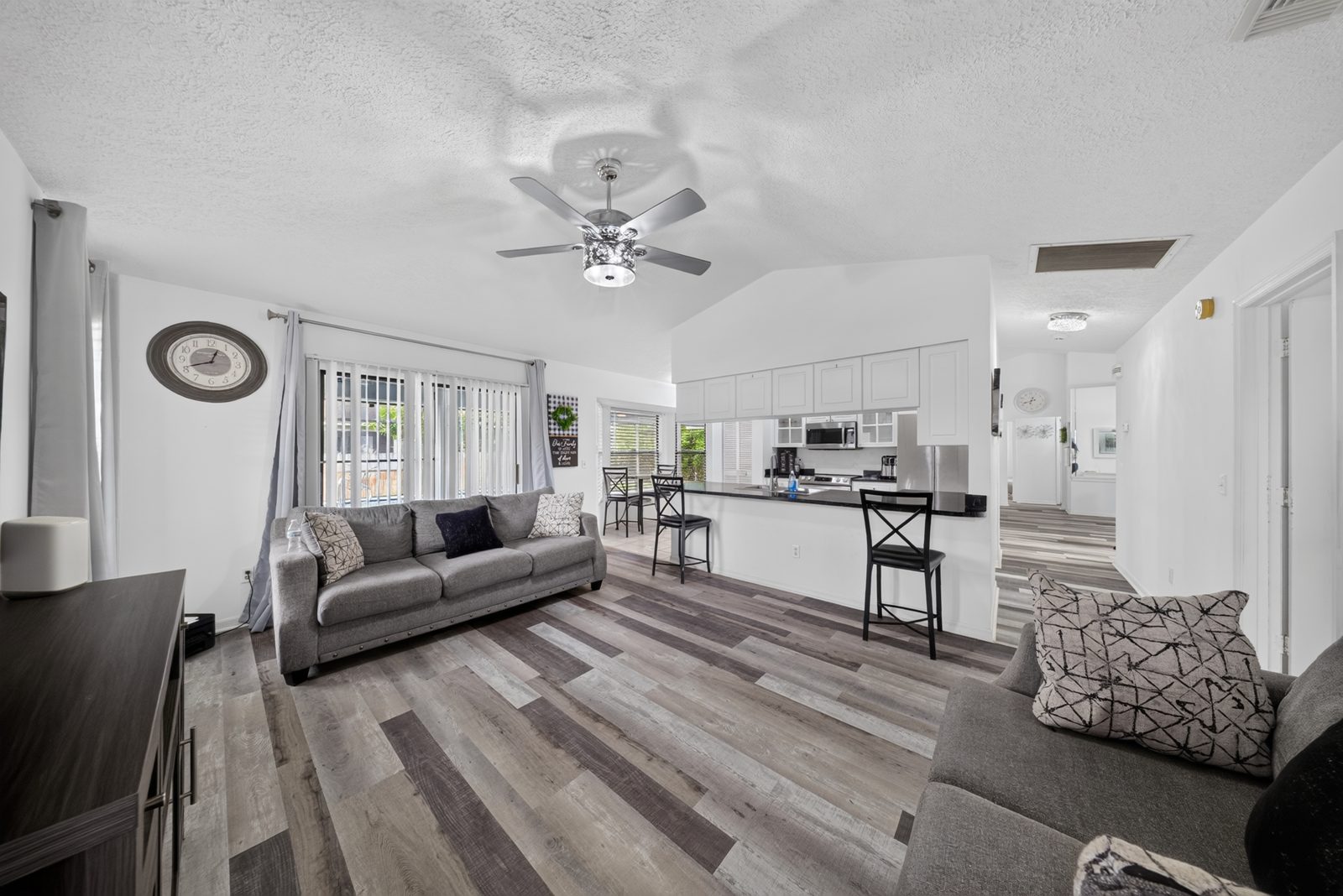 Living area with vaulted ceilings