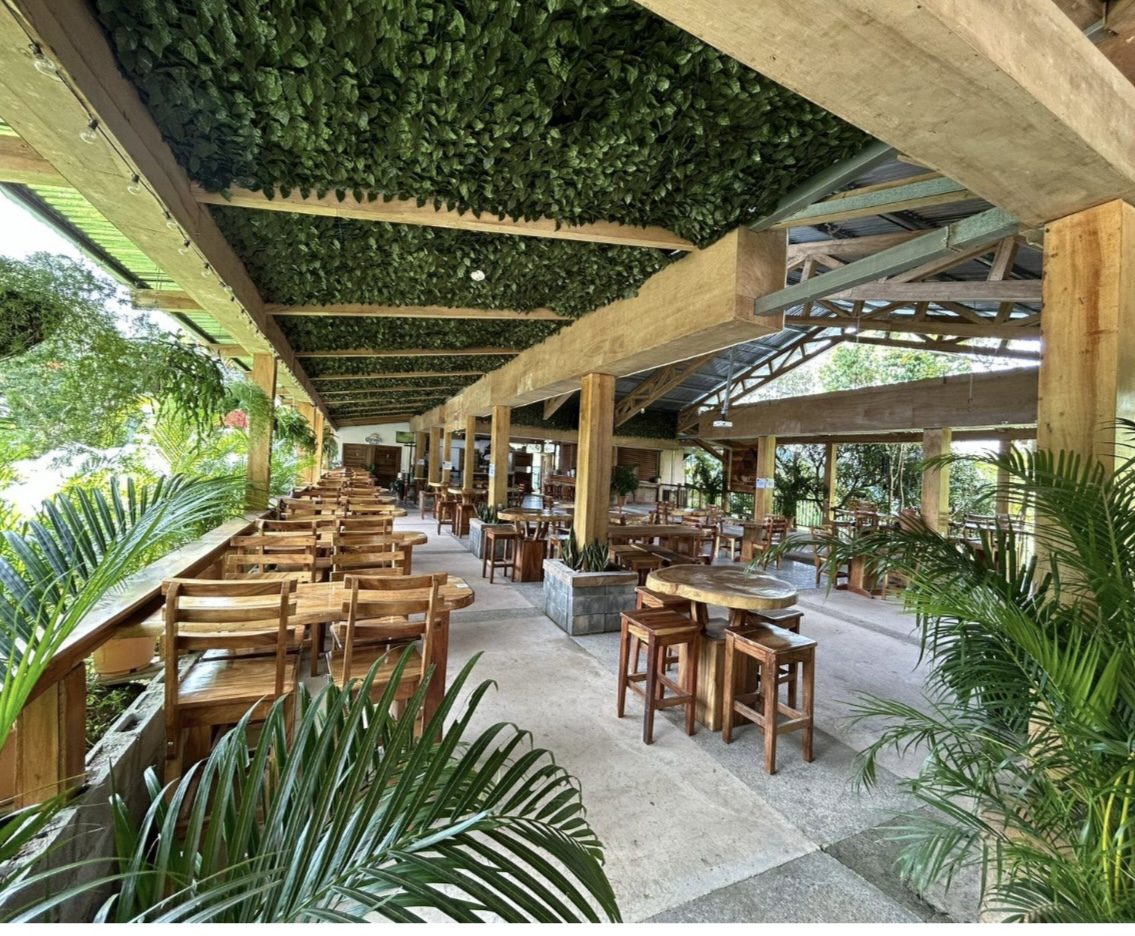 Open-air restaurant terrace at Laguna Lodge
